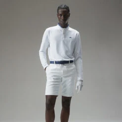 J.Lindeberg Tyson Long Sleeve Golf Polo Shirt 11 J.Lindeberg Tyson Long Sleeve Golf Polo Shirt -Golfausrüstungsgeschäft J.Lindeberg Tyson LS Reg Fit Polo GMJT07801 0000 SHLIN154 WhiteNavy Peony Model 1